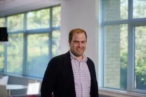 Gary Frear headshot inside office