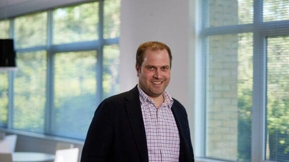 Gary Frear headshot inside office
