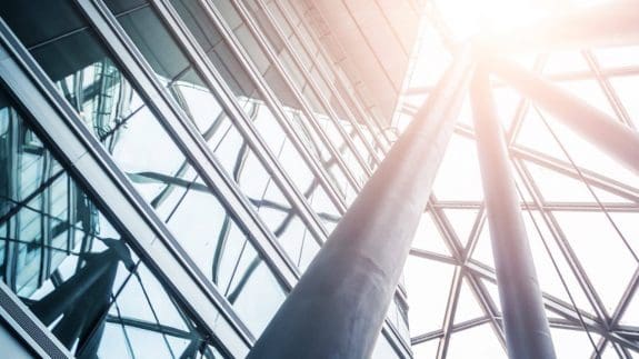 Glass building with sun reflection