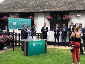 Gary Fraer presenting trophy to jockey