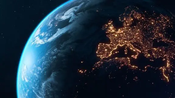 Image of the Earth from space with the lights from each country shining brightly.