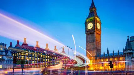 London at night with big ben and blurred lights