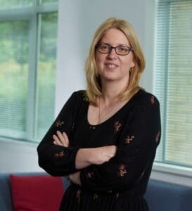 Donna staff photo standing in office