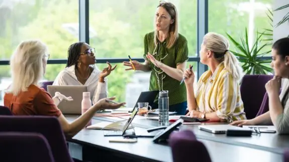 A board room meeting of a women-only team.