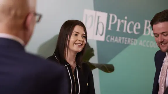 Holly Gibson and Sean McCann in Price Bailey office