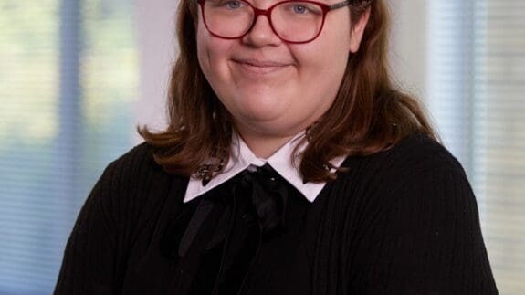 Sîoned Davies staff photo smiling in office