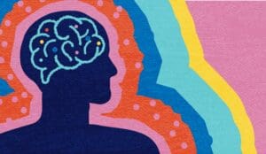 A colourful illustration of a man's silhouette including his brain drawn in blue.