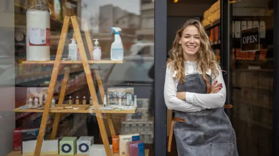 Portrait of a proud young Caucasian female owner of the small business, a retail store