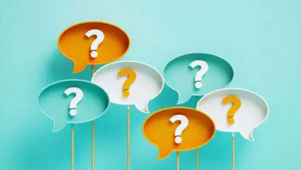 Question Marks Written Speech Bubbles On Blue Background