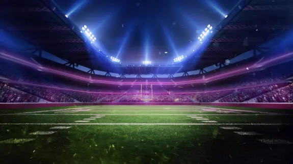 Aerial render American football, soccer stadium with blurred tribunes with fans, empty arena in neon light. Open air match. Professional sport, event, tournament, game, championship concept