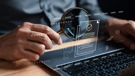 Visual representation of online document review, reflecting scrutiny in Charity Commission investigations
