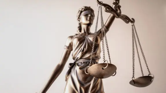 Legal rights concept Statue of Lady Justice holding scales of justice