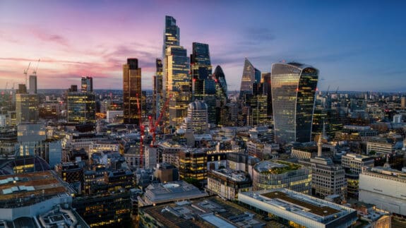 Aerial view of the illuminated skyscrapers at the City of London