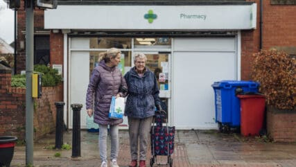 A mature woman out and about with her mother